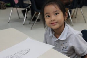 student at desk